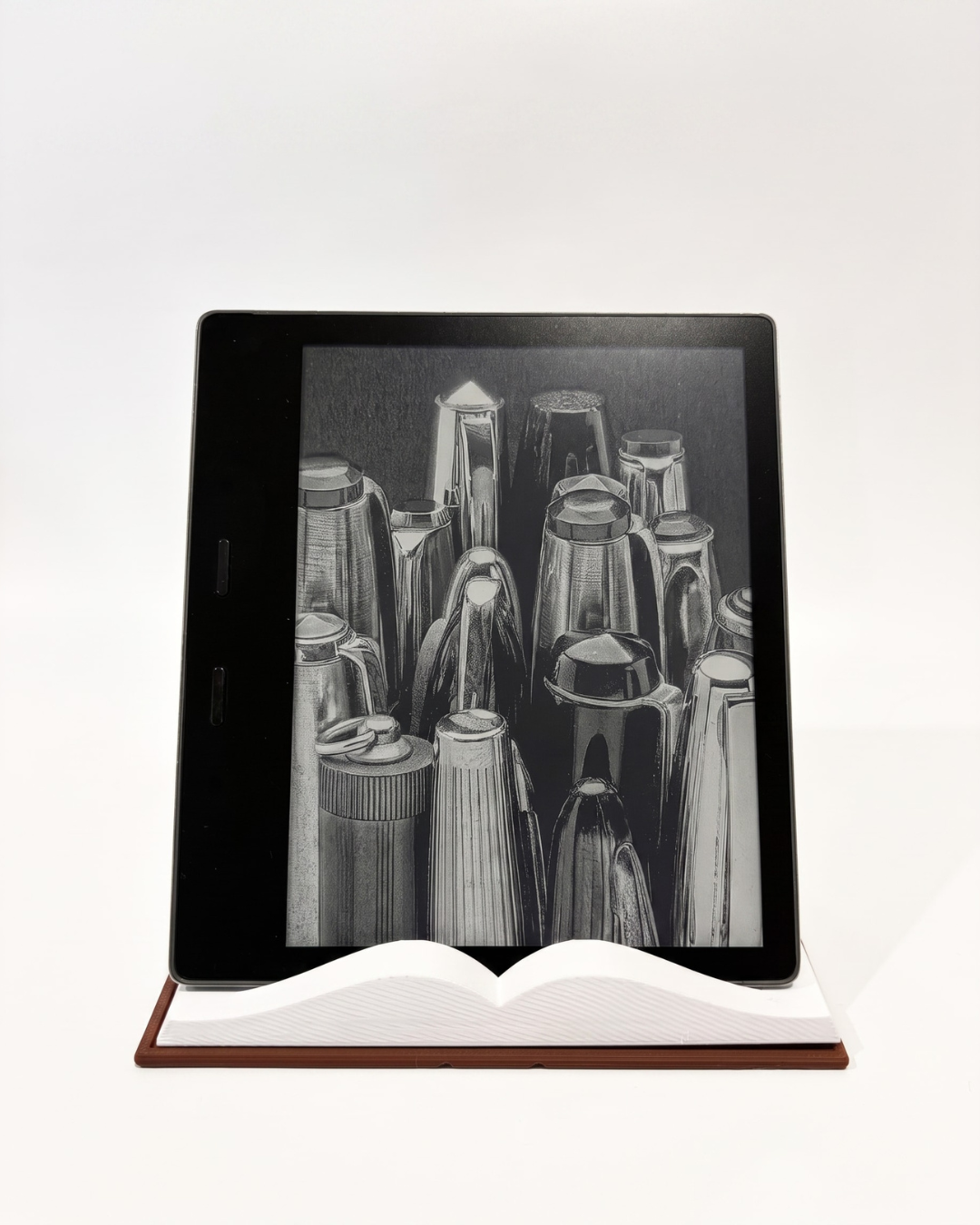 3D device stand that looks like a book holding a kindle