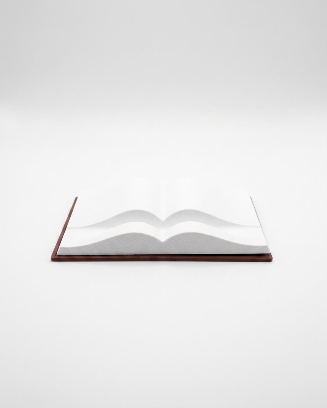 3D device stand that looks like a book