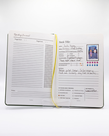 Open Nook Box reading journal showing completed book review pages, star ratings and reading notes.