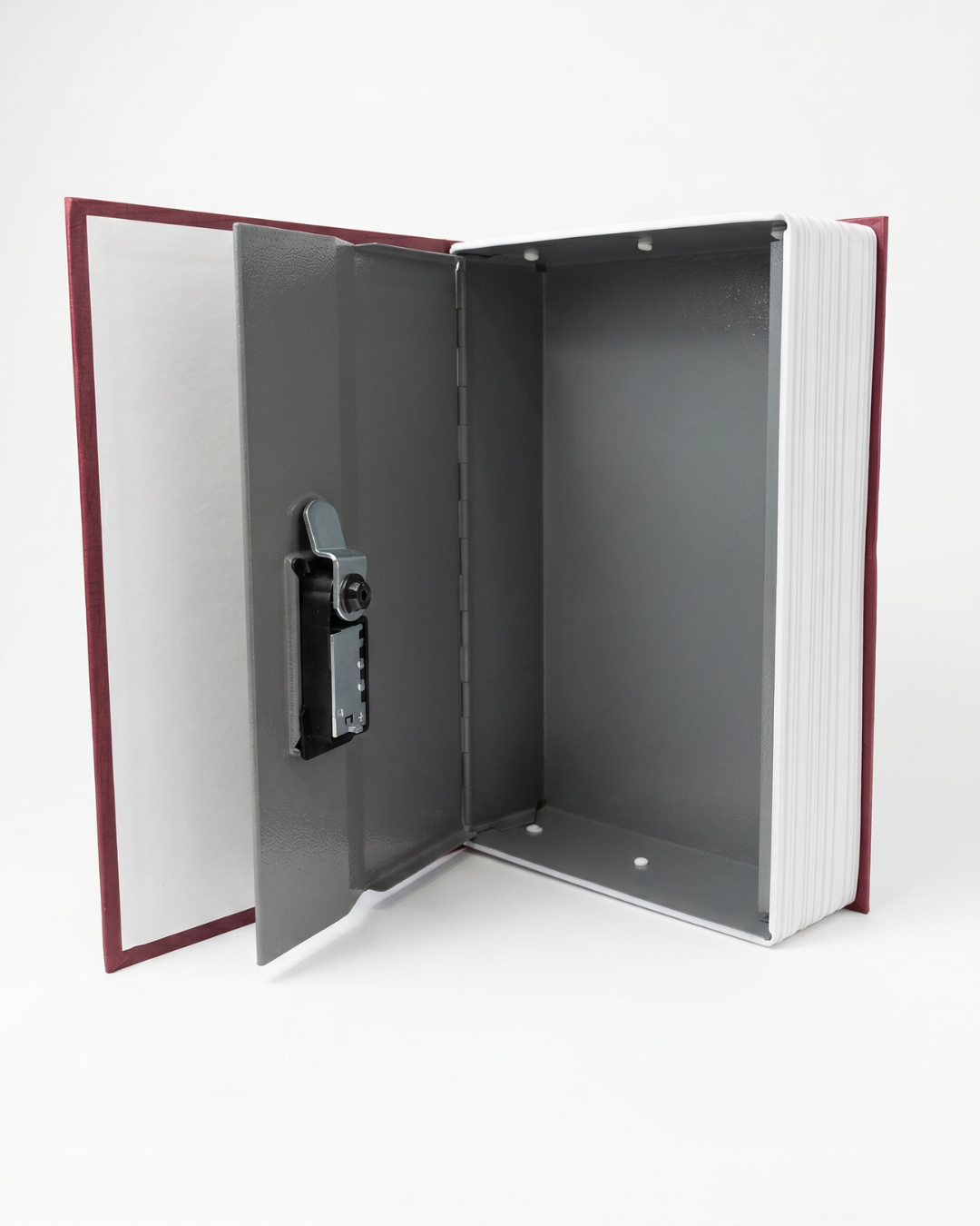 Hidden combination lock book safe opened to reveal secure metal storage compartment inside a realistic book cover.