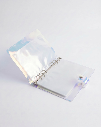 Open iridescent A5 character art folder with six-ring binder, 10 clear protective sleeves, and snap closure for storing bookish art prints, character cards, and bookmarks.