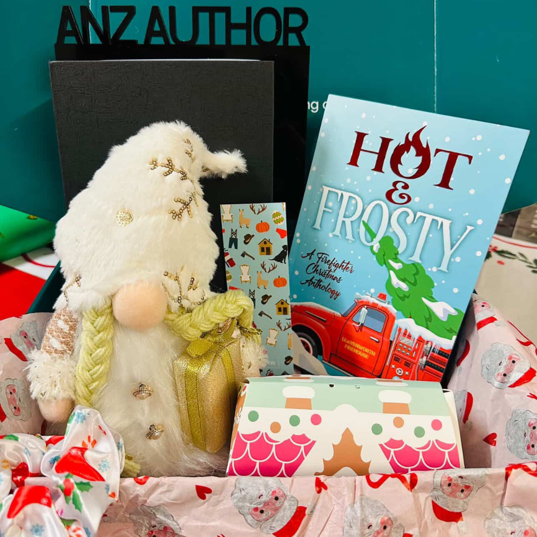 December 2025 Nook Box featuring Hot & Frosty firefighter Christmas anthology with festive bookish gifts, Christmas gnome and ANZ author shelf decor