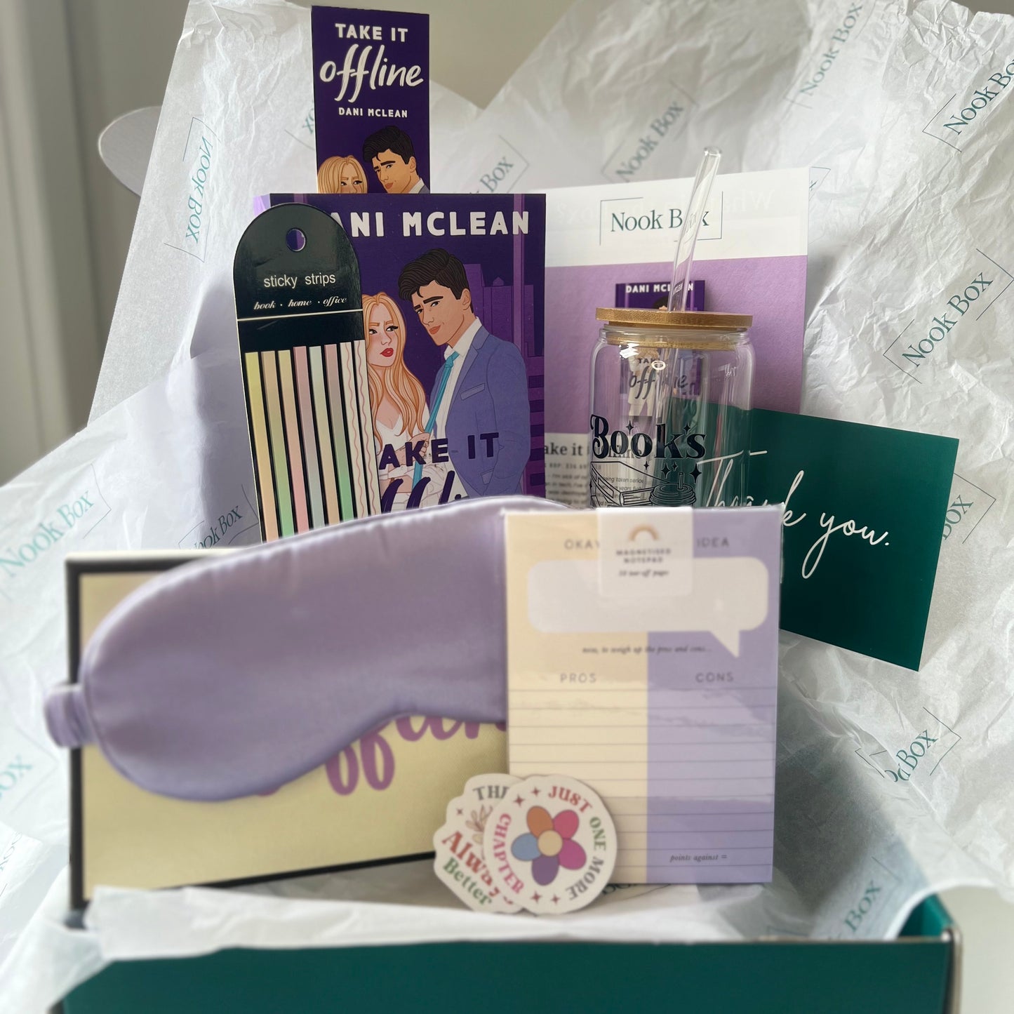 Nook Box featuring Take It Offline by Dani McLean with glass bookish cup, sticky tabs, sleep mask, reading accessories and bookish gifts.